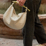 Woven Crescent Handle Statement Bag